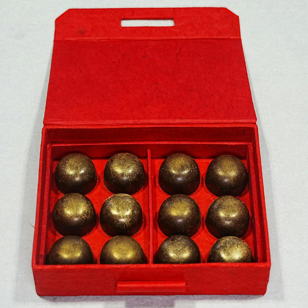 Knipschildt-Chocolatier-vegan-passionfruit-truffles-12-piece