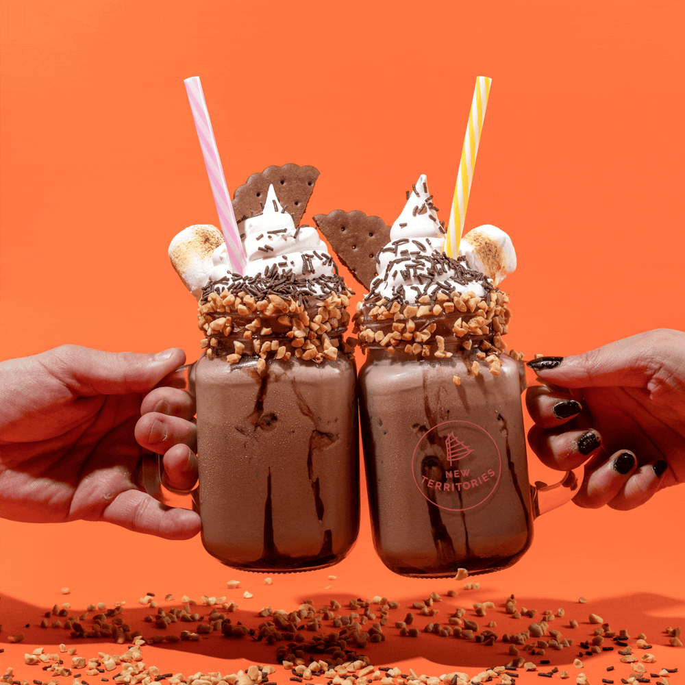 New_Territories_Mr_Grumpy_Milkshake_GIF_1x1_cheers_