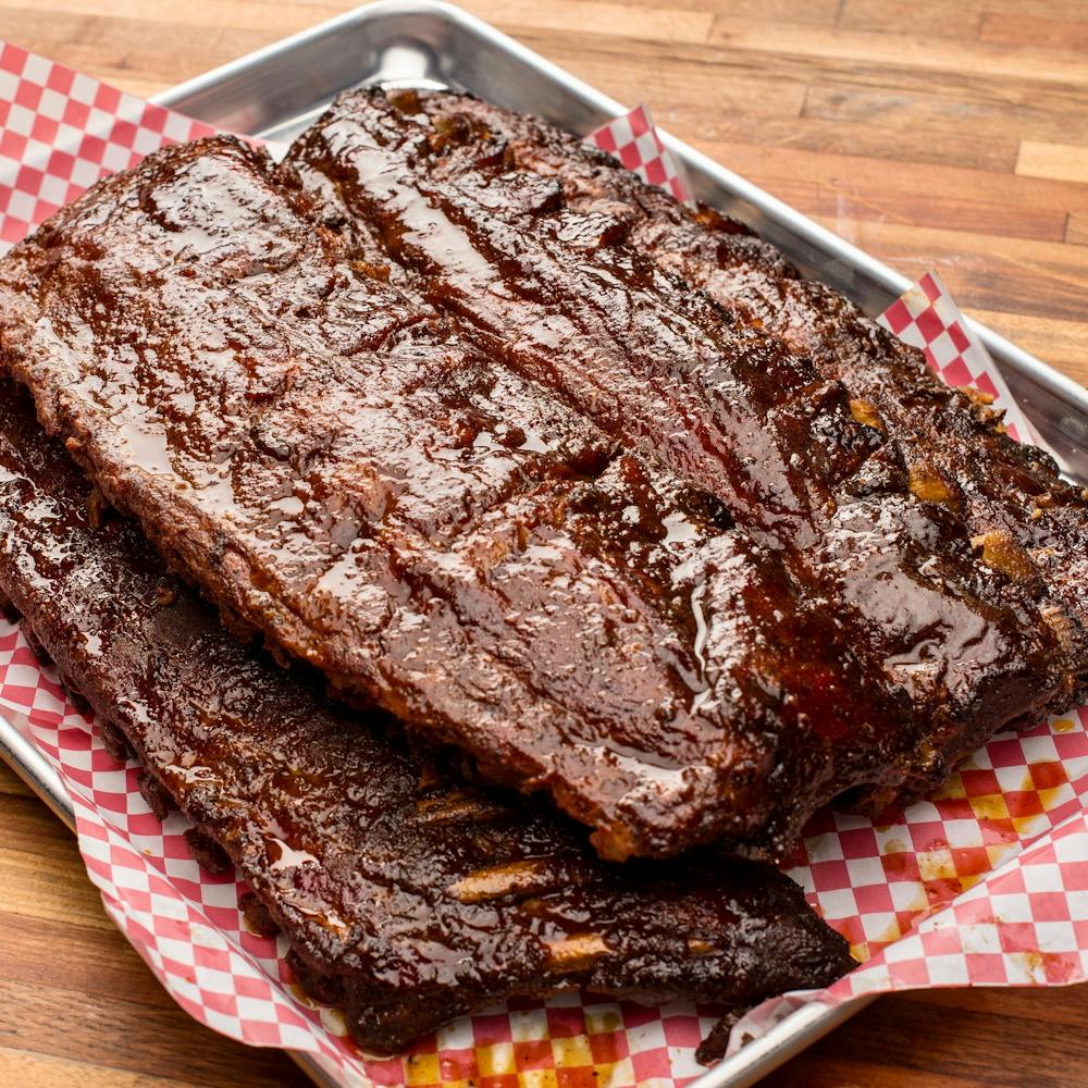bbq-baby-back-ribs-4-racks.0db1589a7350803ec291ee0bbbb3aa81