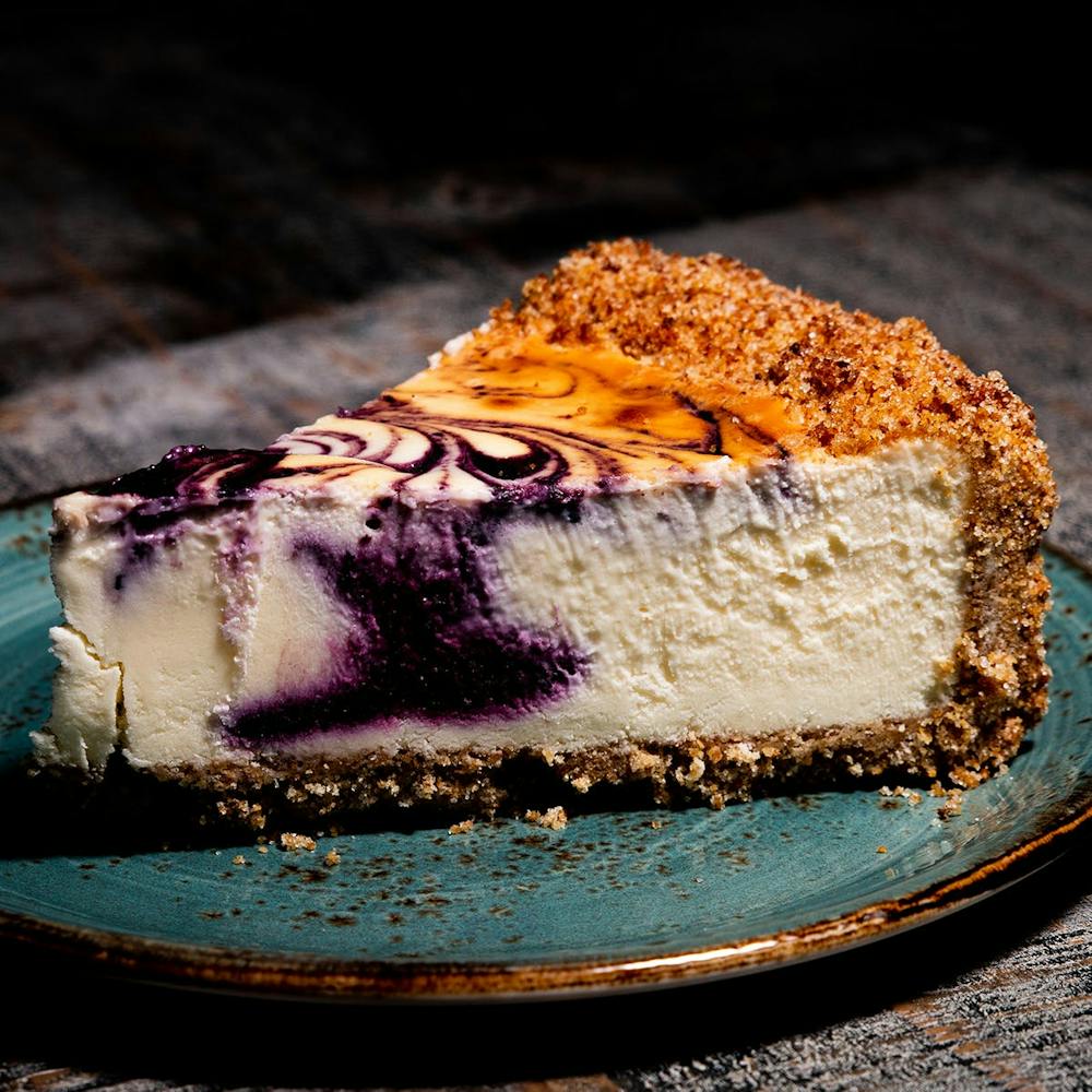 blueberry-swirl-cheesecake.eca39f47775a26715d192ade32ca8a4d