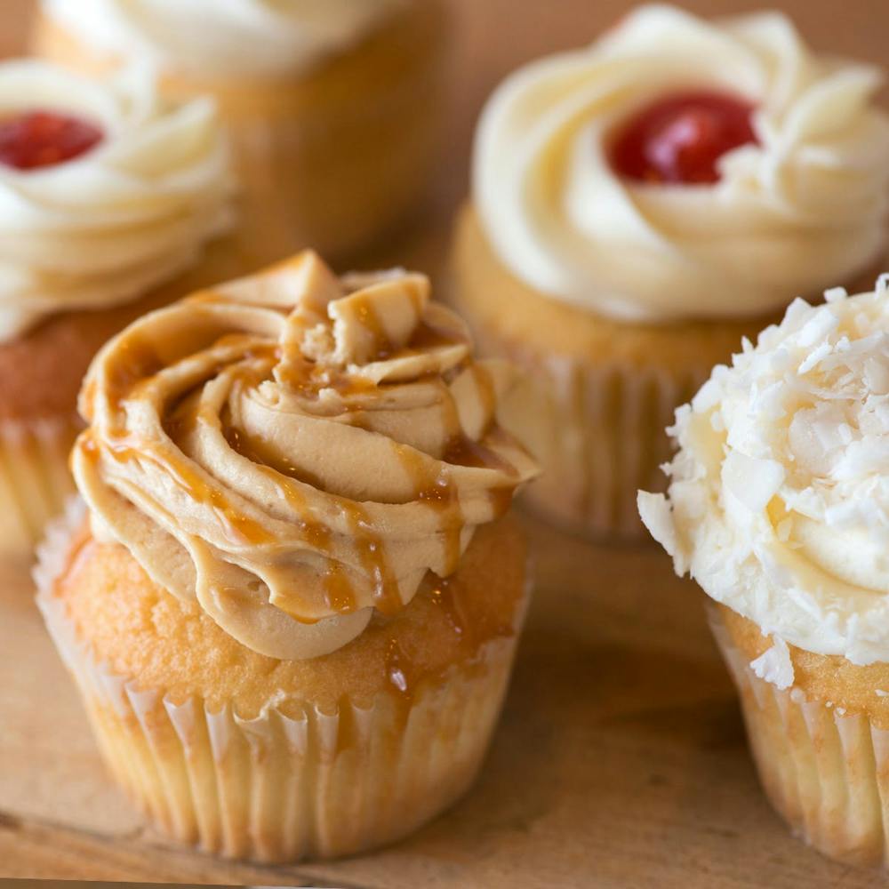 latino-cupcake-assorted-dozen.7ae03466c3dc272755364d10125b3afc