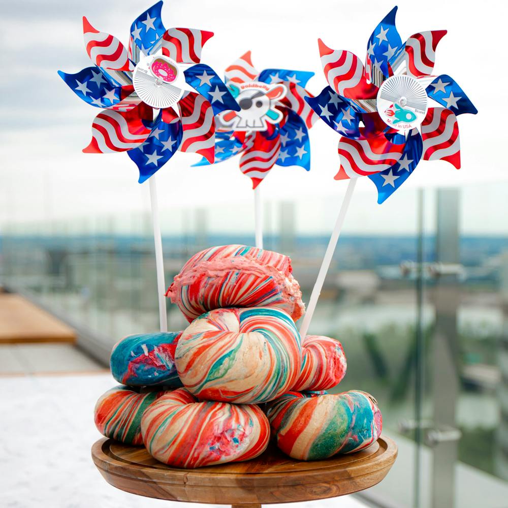 patriotic-tie-dye-bagel-dozen.f2d775495c74d17906d9965f9a7d18e0
